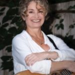 63792033611422676606-Patti-arms-crossed-with-guitar-scaled.jpg